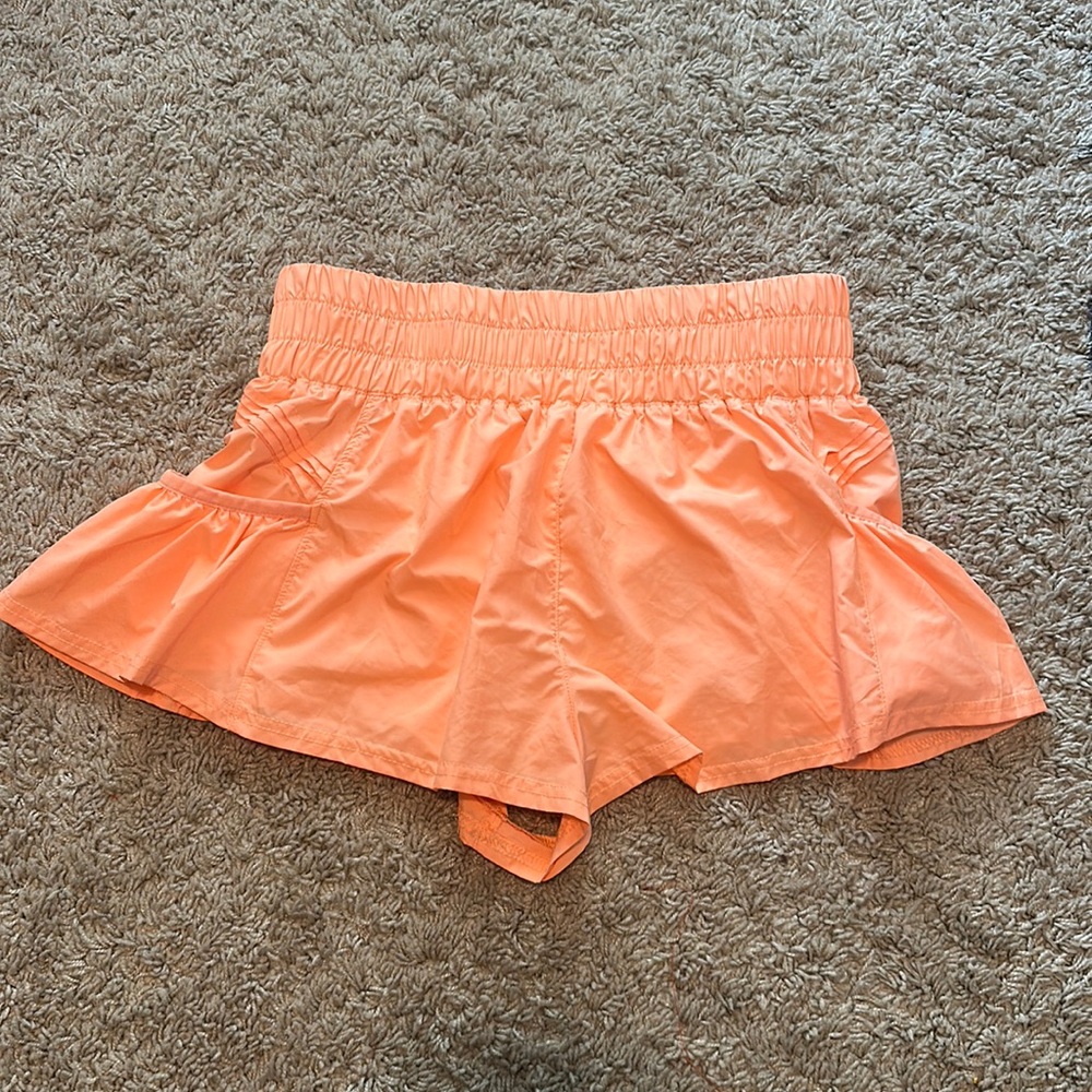 Free People (get your flirt on shorts) size small, color coral